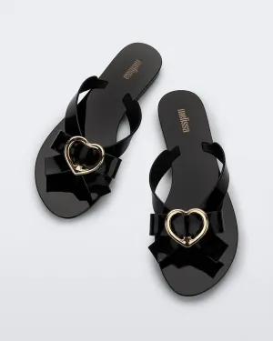 Women's Harmonic Heart Sandal In Black